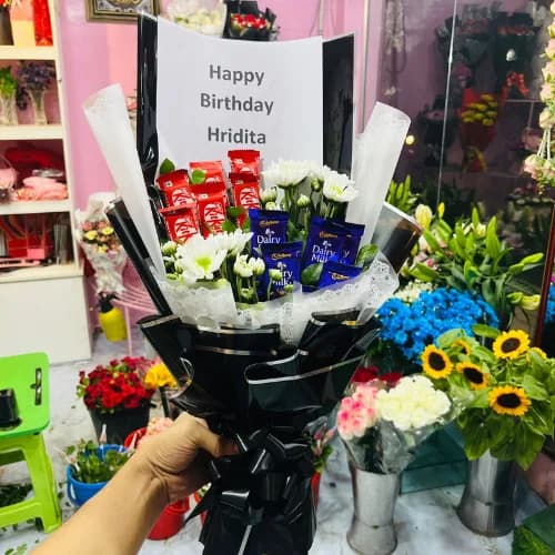 Black Wrapped Birthday Bouquet with KitKat, Dairy Milk & White Chrysanthemums