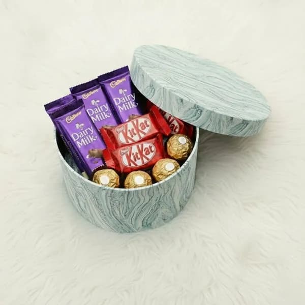 Mixed Chocolate Collection in Elegant MarbleTextured Round Gift Box